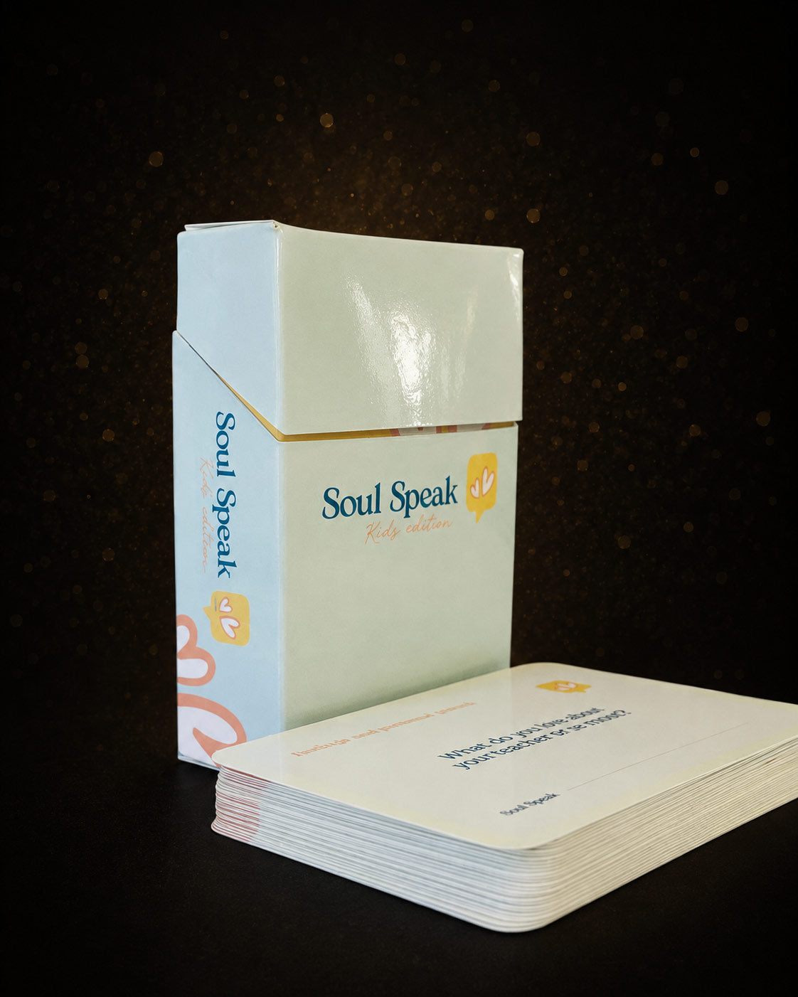 Card deck with 'Soul Speak' Kids edition packaging on a dark background